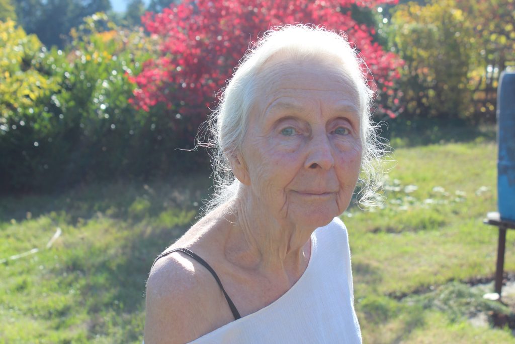 A photo of Bernice Woollam on The Hawthorn property, taken from shoulder-up.