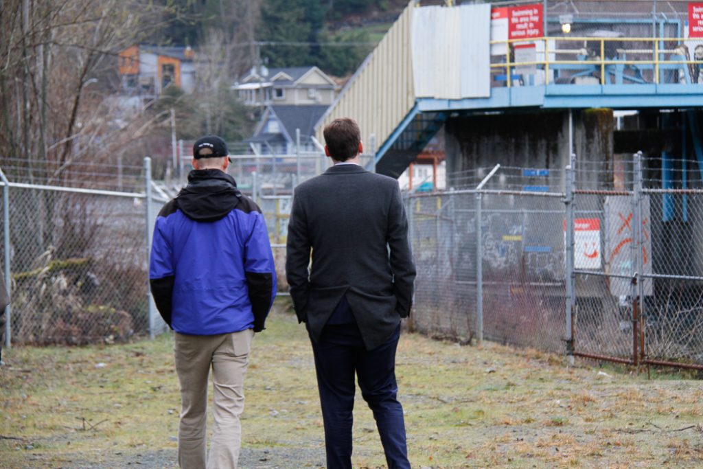 two men pictured from behind